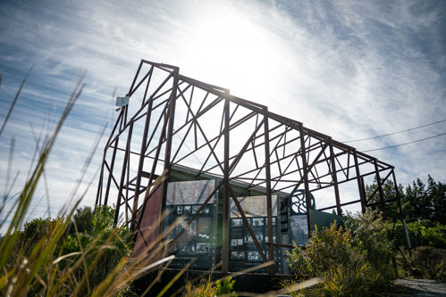A photo of a series of large info panels with text and archival photographs.