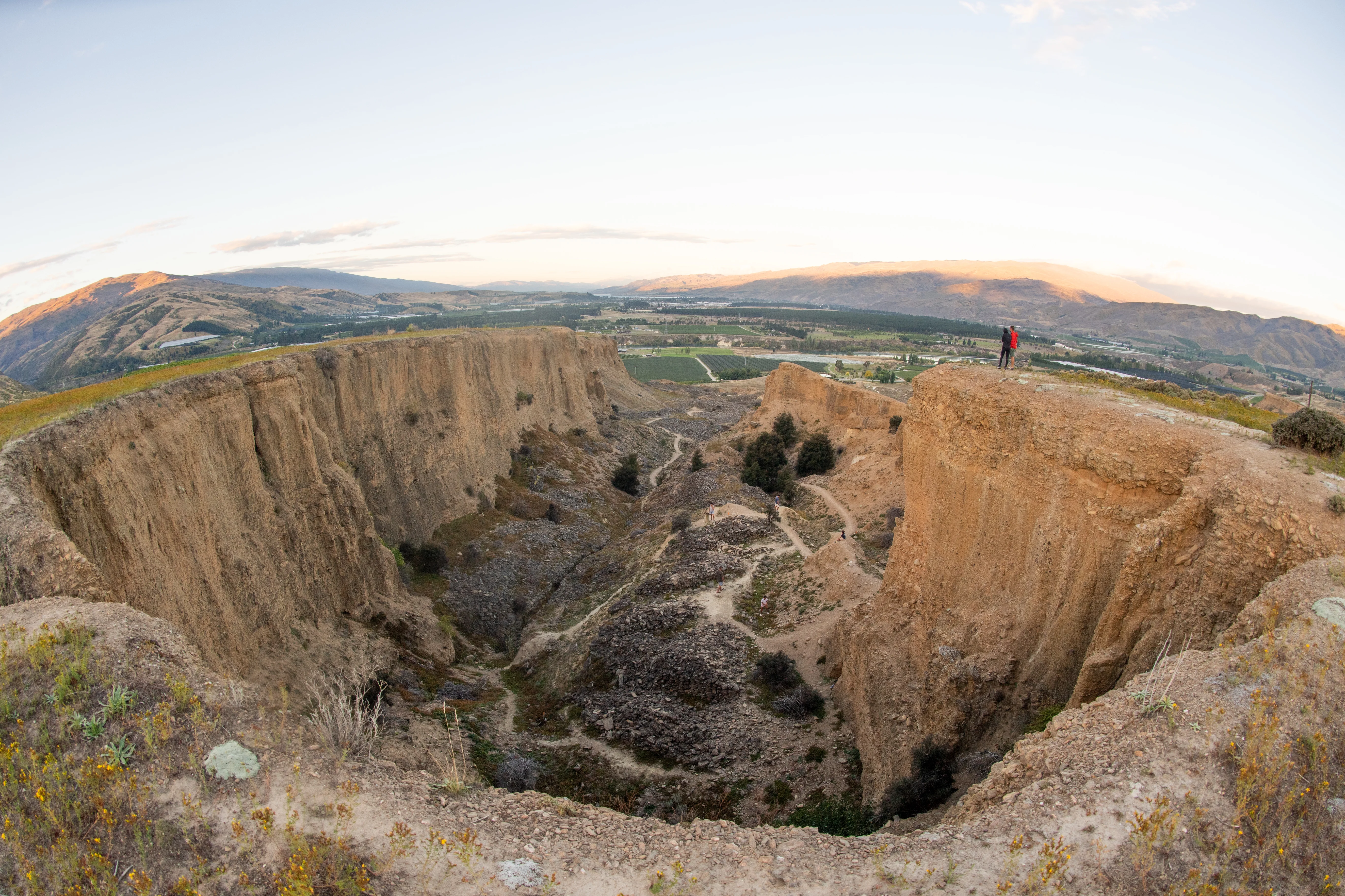A wide shot of the unreal landscape of Bannockburn, where the earth has been sluiced into a massive canyon. 